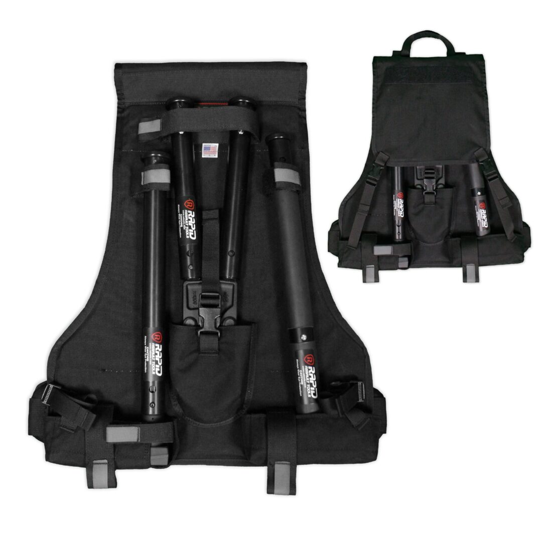 A black backpack with some poles in it