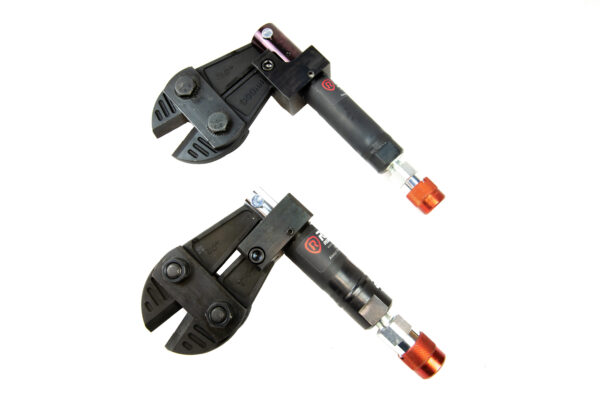 A pair of pipe wrenches with an orange handle.