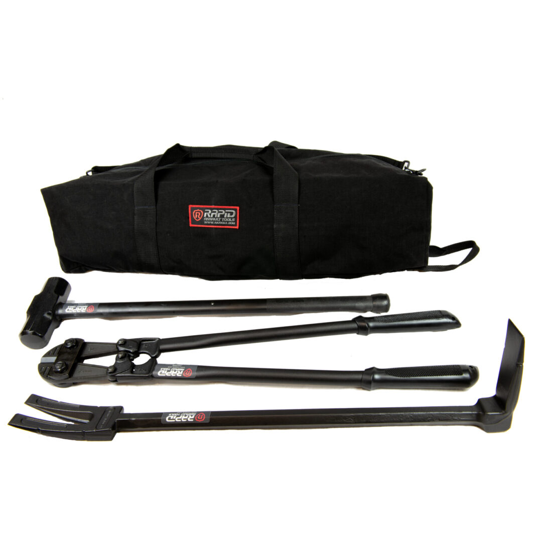 A set of tools is shown in front of a bag.