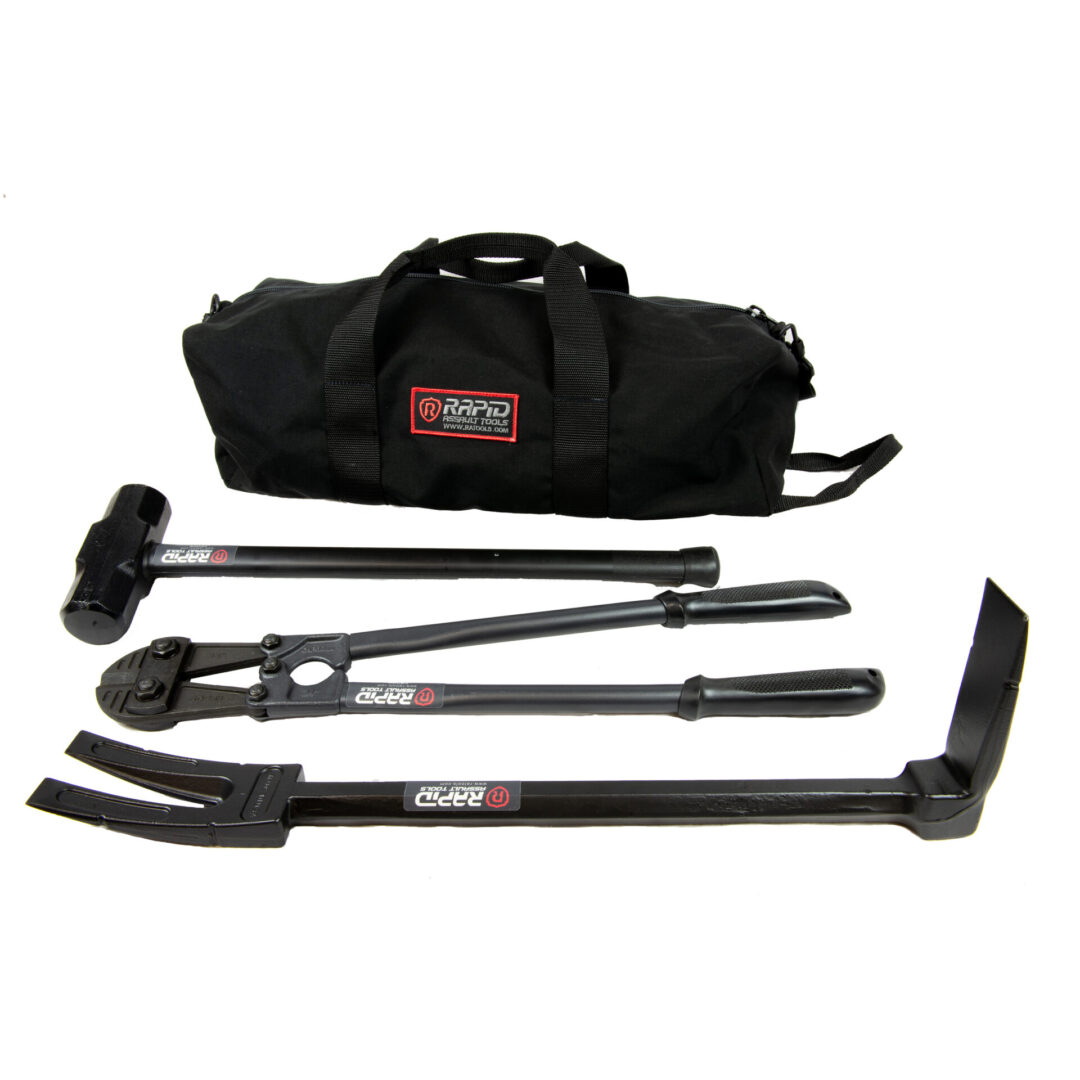 A set of tools is sitting on top of a black bag.