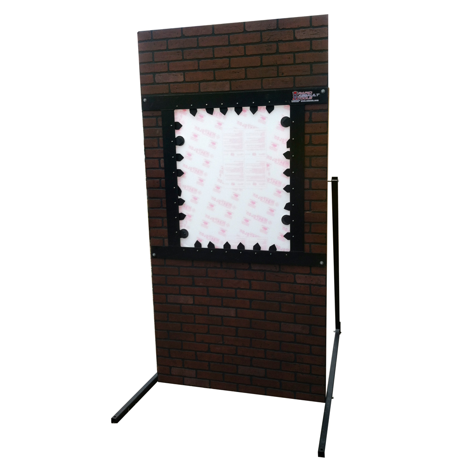 A brown brick wall with a white window.