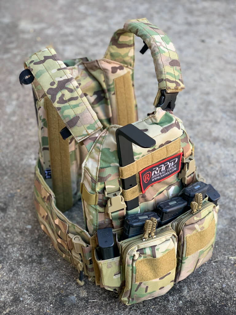 A small backpack with many pockets and straps.
