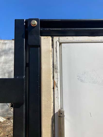 A close up of the door frame and window