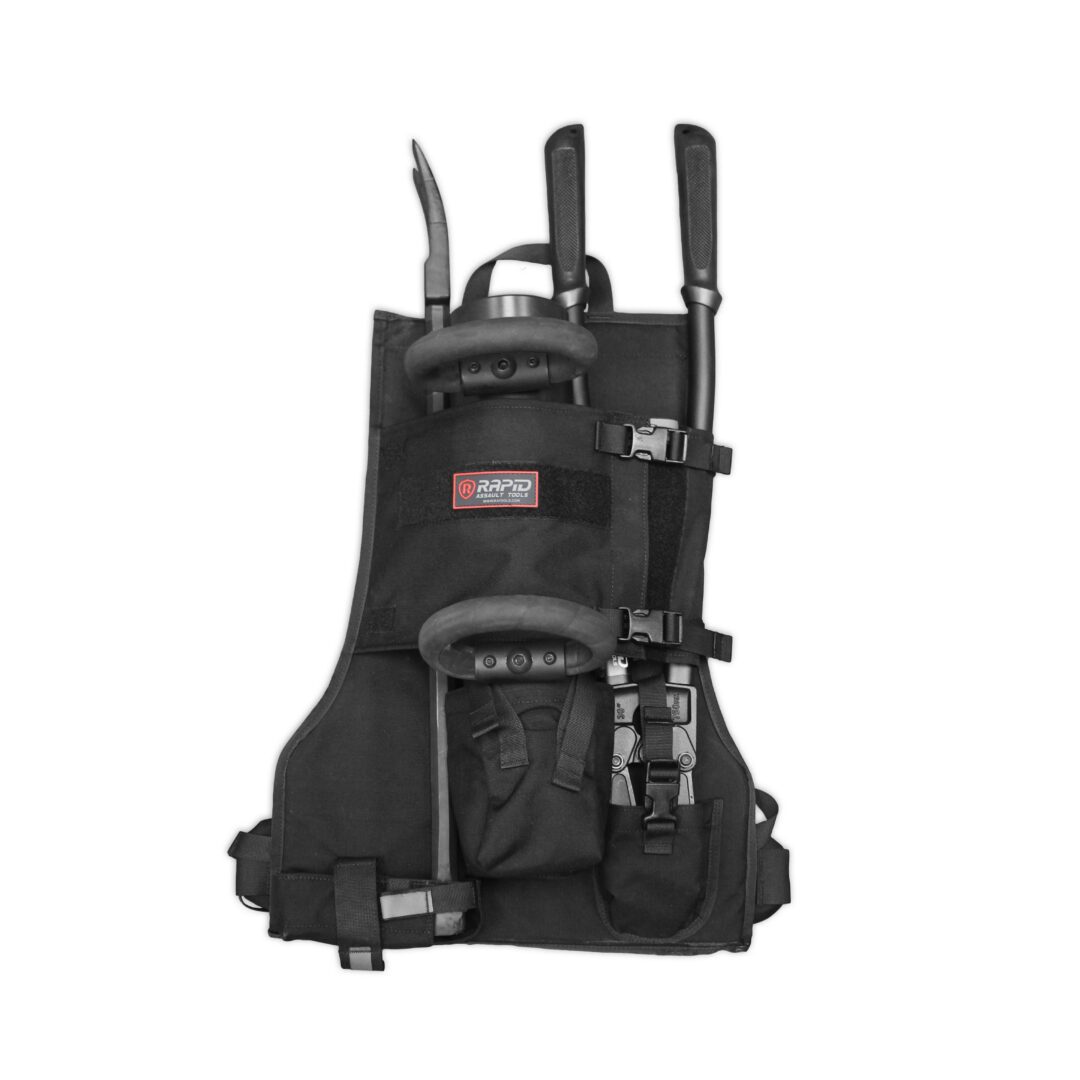 A black backpack with some poles attached to it